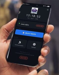 Hand holding a phone running the FlexPatrol app on its Select Route screen